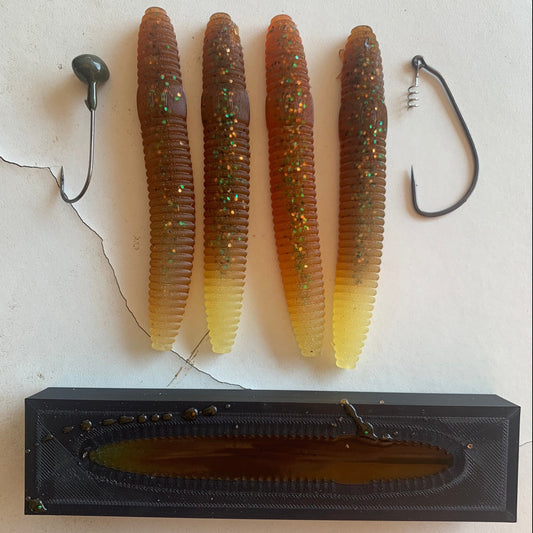 Open Top Lure Mold and a Package of Recycled Hand Poured Creature