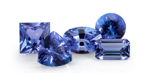 a selection of natural tanzanite faceted gemstones