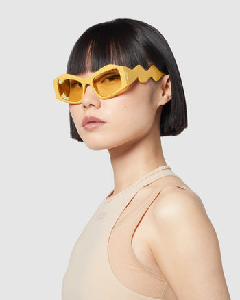 Bottega Veneta Wrap Around Sunglasses in Yellow