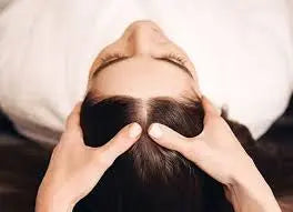 Brunette getting a scalp massage