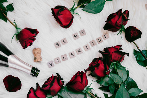 Be My Valentine scrabble letters surrounded by red roses
