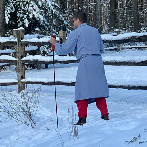 Jay wearing his lightweight alpaca crew socks to feed the birds in 20 degree weather