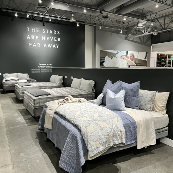 large showroom with luxury beds