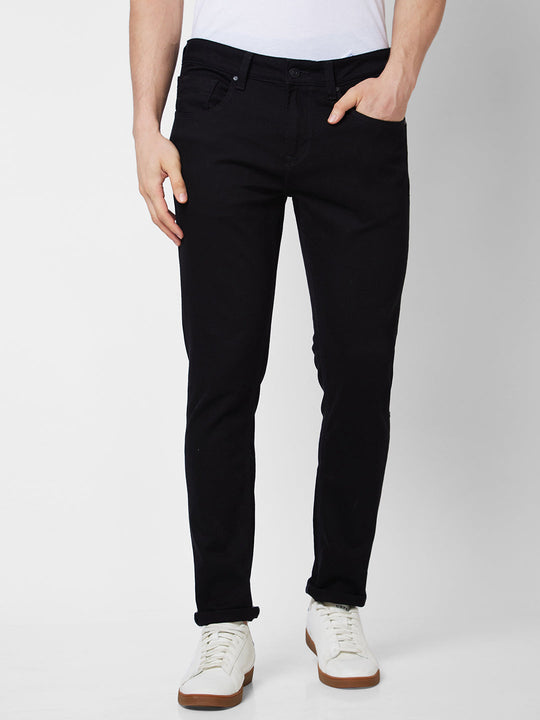 The best black jeans for men: Class up your casual look - The Manual