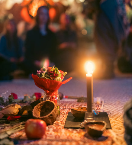 An altar for Cacao ceremony with people gathered around it