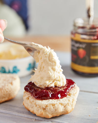 clotted cream on to scone