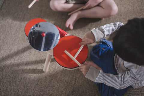 Child playing drums