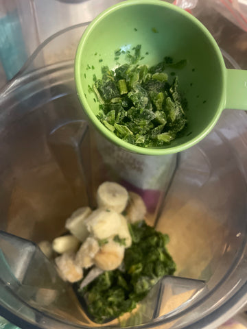 Ingredients in measuring cup, preparing to be blended