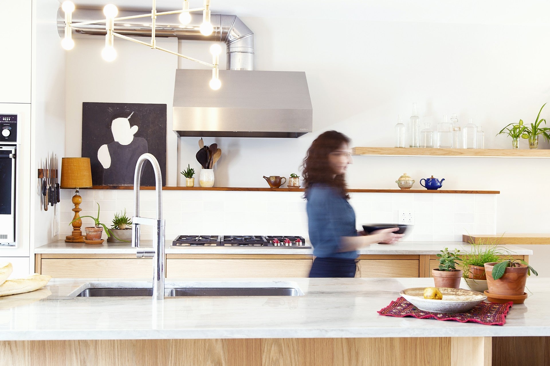 Coquo modular kitchen cabinets in natural oak. One drawer and two wood shelves. 