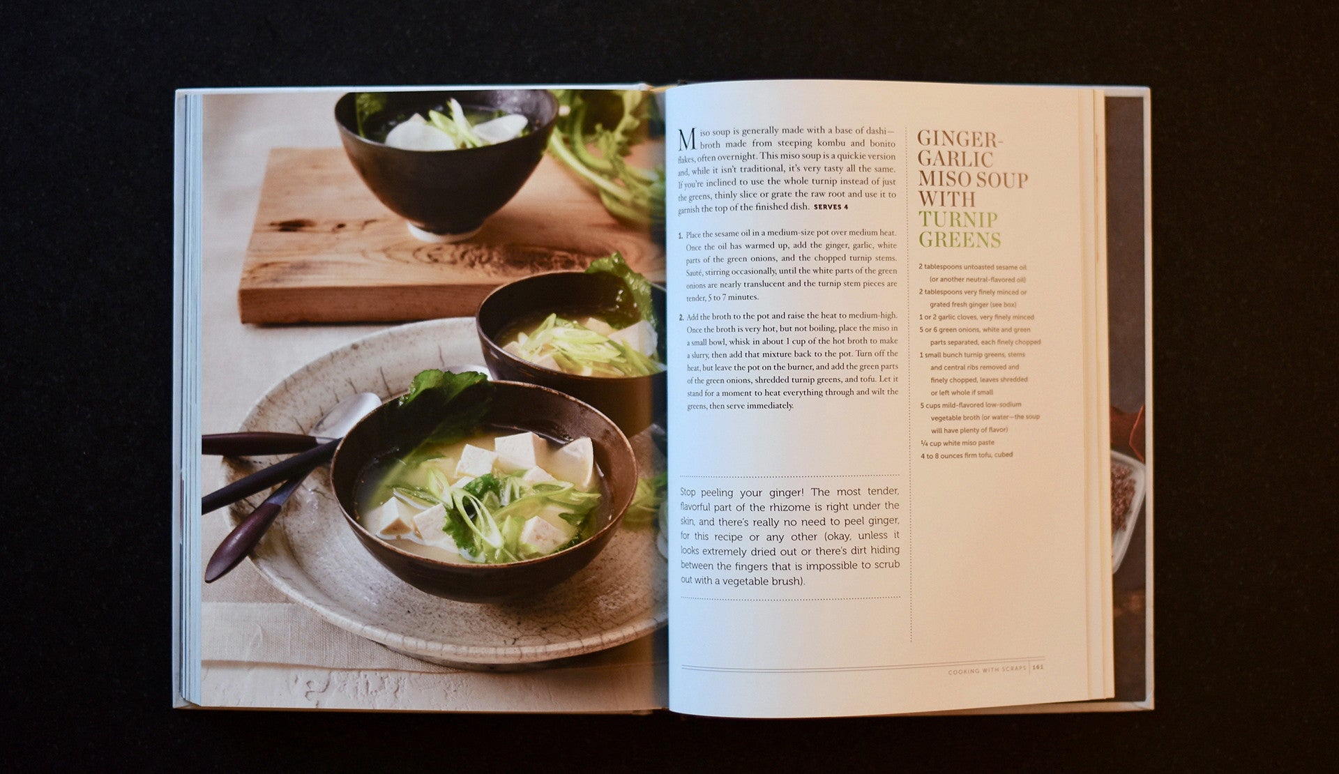 Opened recipe book. left page shows a ginger garlic miso soup and right the recipe that follows. 