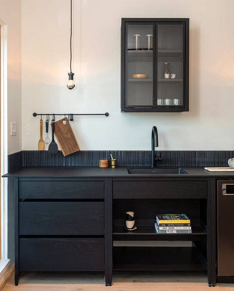 Coquo modular kitchen cabinets in black stained oak.