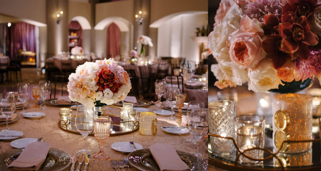 a table with glasses and flowers