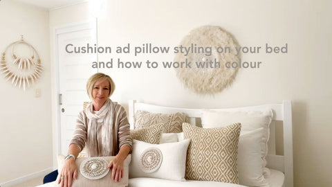 How to style your bed with pillows and cushions and the impact colour has.