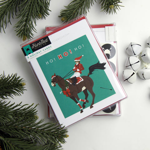 Bolting horse dressed up in Christmas holiday attire, with a girl dressed as Santa about to fall off! Funny Horse Christmas card for horse lovers and equestrians