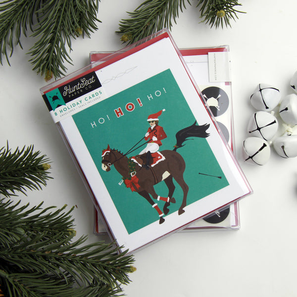 woman falling off horse in holiday costume yelling ho! ho! ho! equestrian christmas card