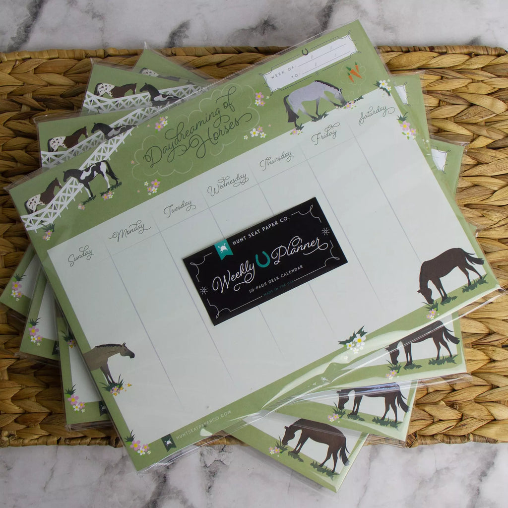 Equestrian weekly planner and calendars with horses on them