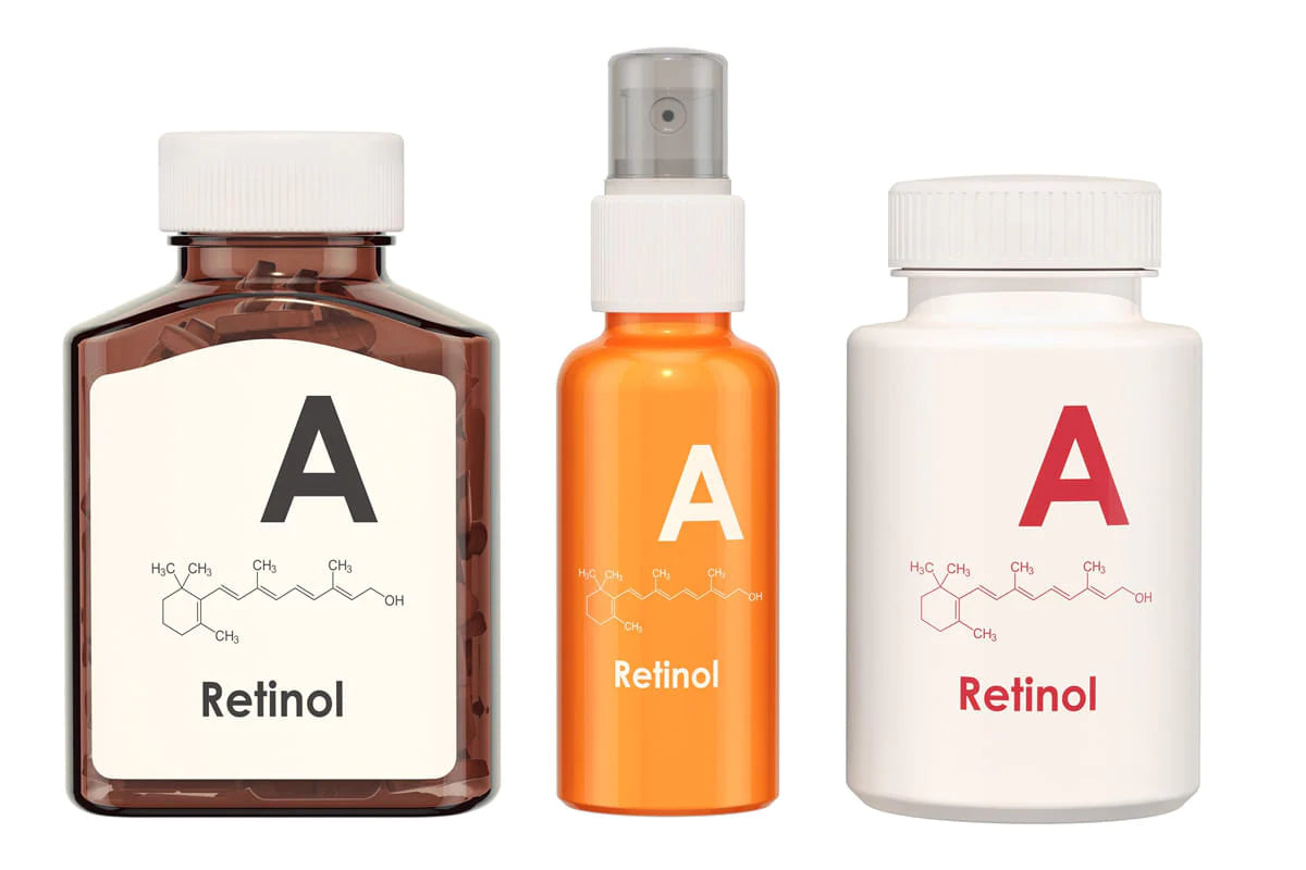 Three different retinol bottles lined up together