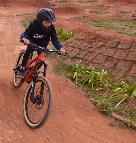 13y girl riding Tiny Rock bike