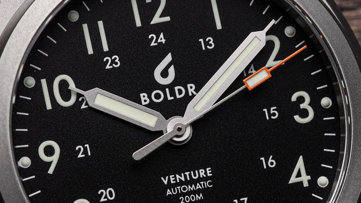 The BOLDR Venture Carbon Black Automatic Field Watch dial and hands