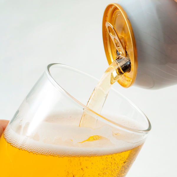 pouring beer into a glass