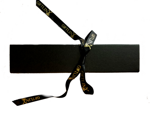 Black gift box with black and gold ribbon