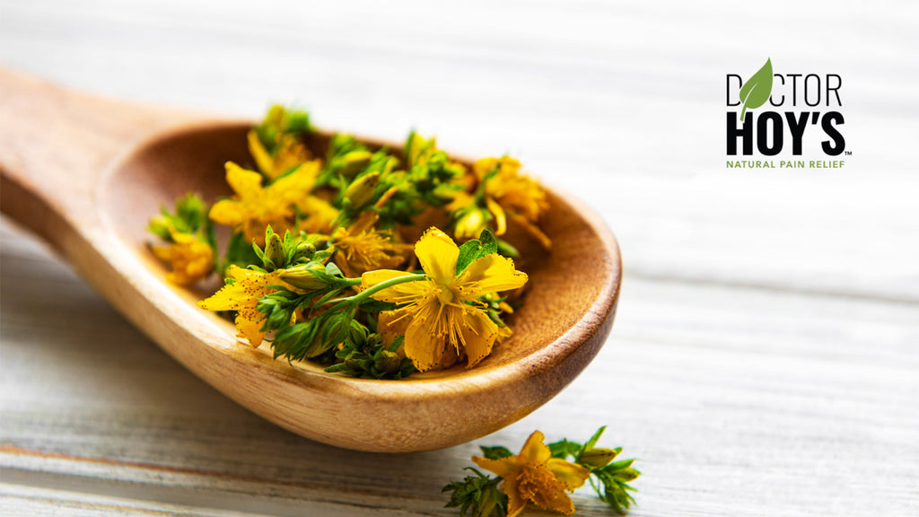 small yellow flowers on a wooden spoon