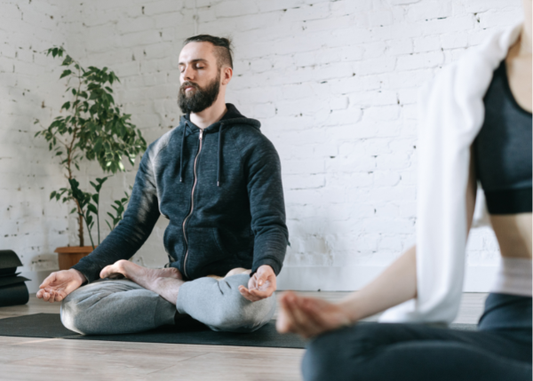 Man meditating to reduce stress