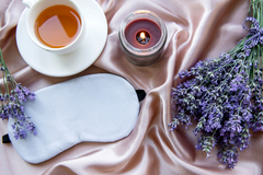 sleep mask, tea, candle and lavender