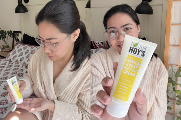 Woman holding arnica cream and depositing it on hand