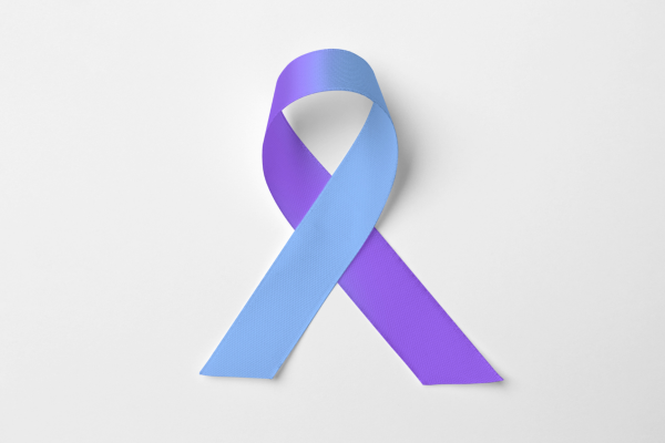 Half blue and half purple ribbon for arthritis awareness month