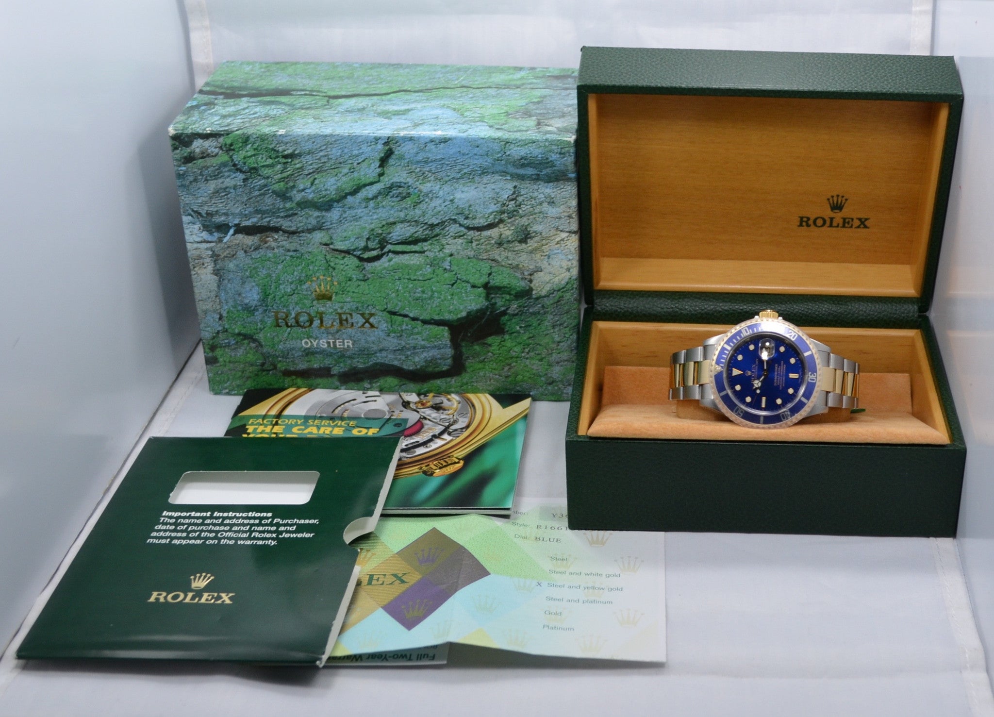 Rolex Submariner 16613 Steel 18K Gold Blue 