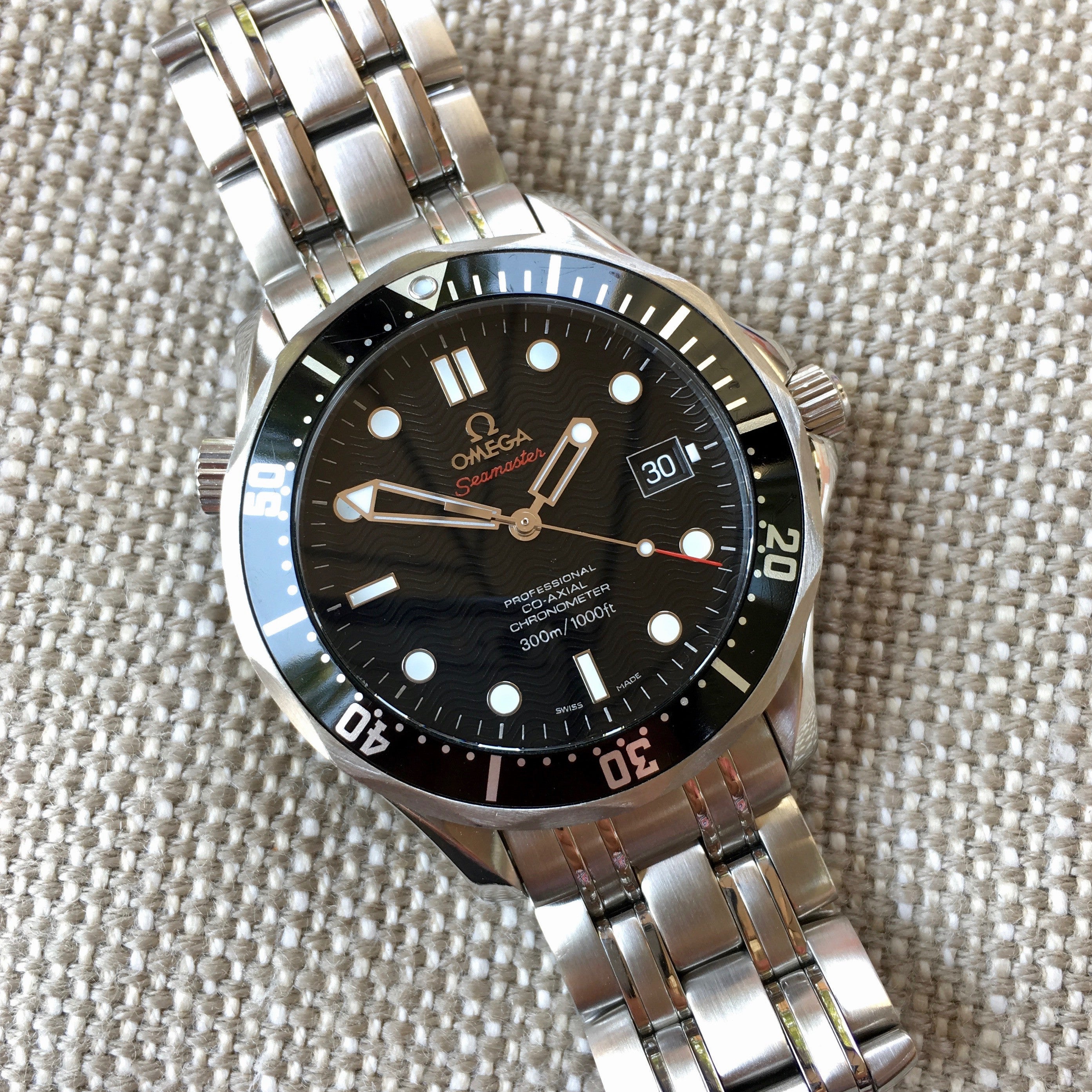 omega seamaster black wave dial