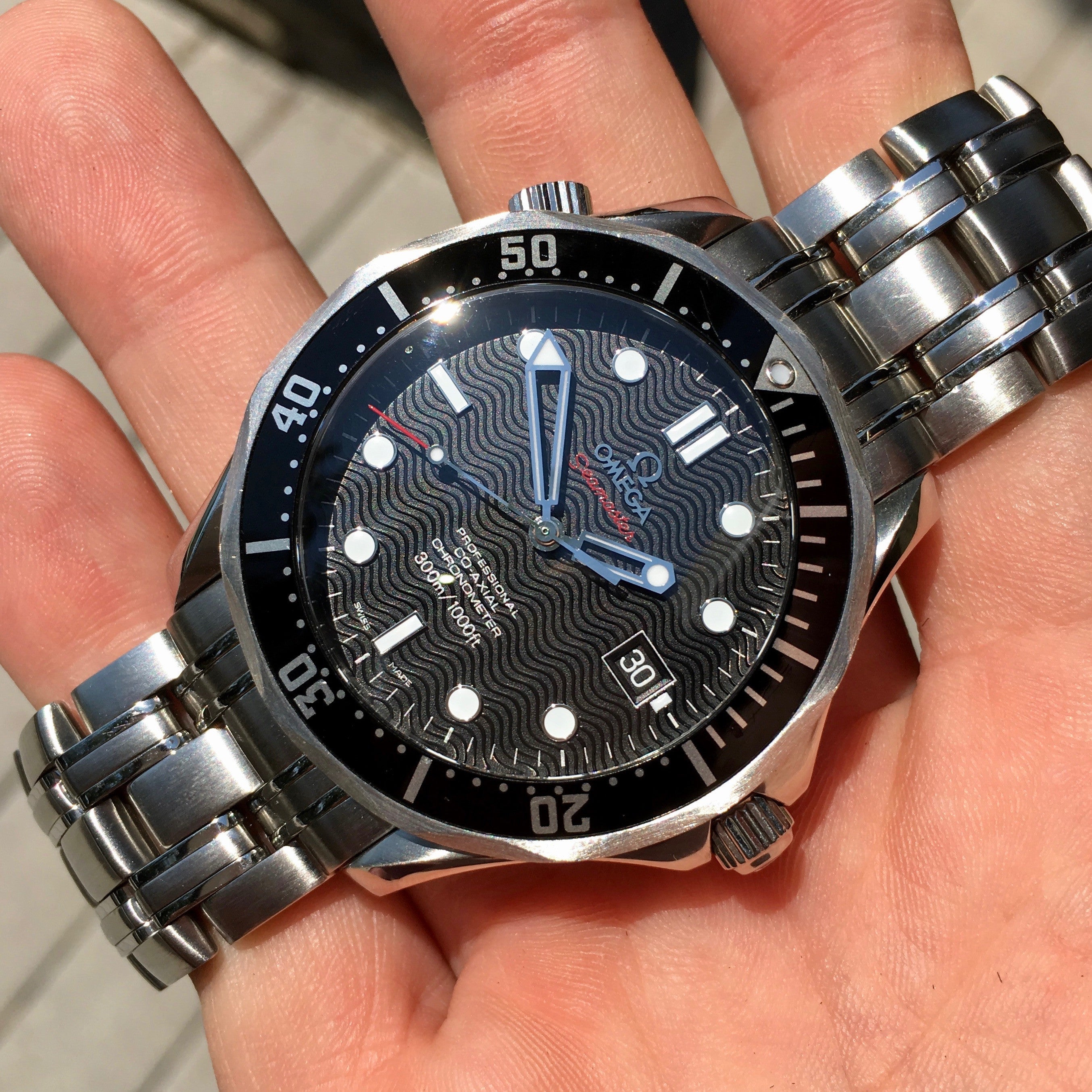 omega seamaster black wave dial