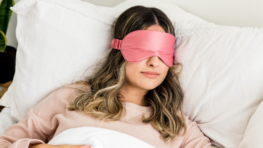 Girl sleeping with a sleep mask on