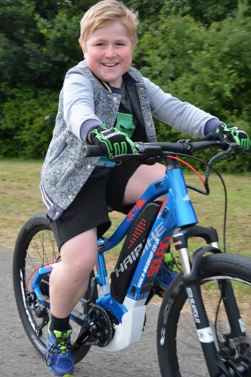 Boy with Muscular Dystrophy on Electric Bike