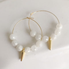 gold hoop earrings with faceted moonstone beads and gold charm