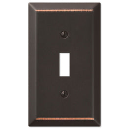 The aged bronze version of the Century collection of Amerelle decorative metal wallplates