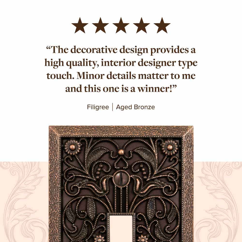 A picture of the Filigree aged bronze wallplate with a happy customer review above it reading 