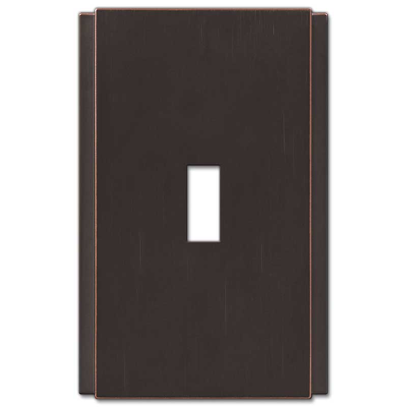 The aged bronze version of the Zen Screwless collection of Amerelle decorative metal wallplates