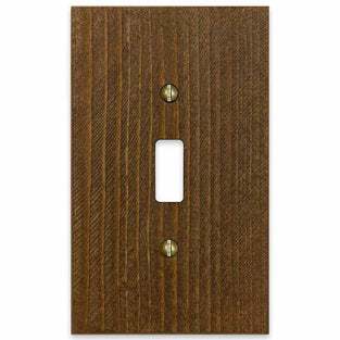 The rustic brown version of the Montana collection of Amerelle decorative wood wallplates