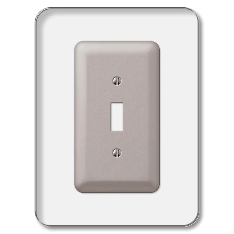 A photo of a wallplate behind the clear wall guard accessory