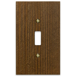 The Montana collection of Amerelle decorative wood wallplates in the rustic brown stained wood option