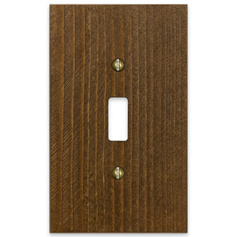 The rustic brown version of the Montana collection of Amerelle decorative wood wallplates