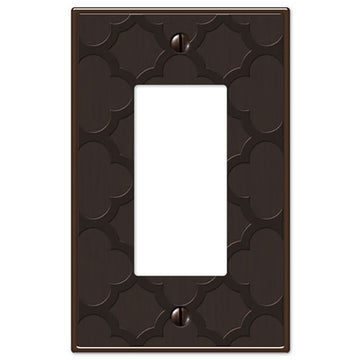 The aged bronze version of the Tangier collection of Amerelle decorative metal wallplates