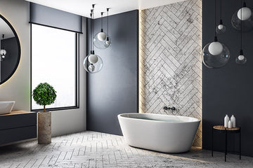Professionally designed bathroom with a Contemporary decor style, a large window, herringbone tile, illuminated walls, a green plant, and a bathtub as the centerpiece of the room