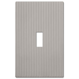 The satin nickel version of the Mies Screwless collection of Amerelle decorative metal wallplates