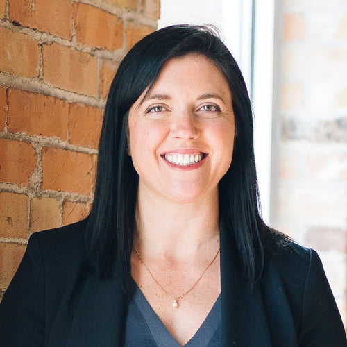 Portrait of a young professional woman looking at the camera