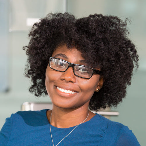 Portrait of a young woman looking at the camera