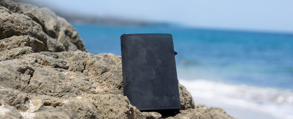 leather apple airtag wallet on the beach