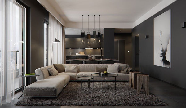 Living area room with black painted walls grey area rug upholstered L-shape sofa modern pendant lights black floor tiles